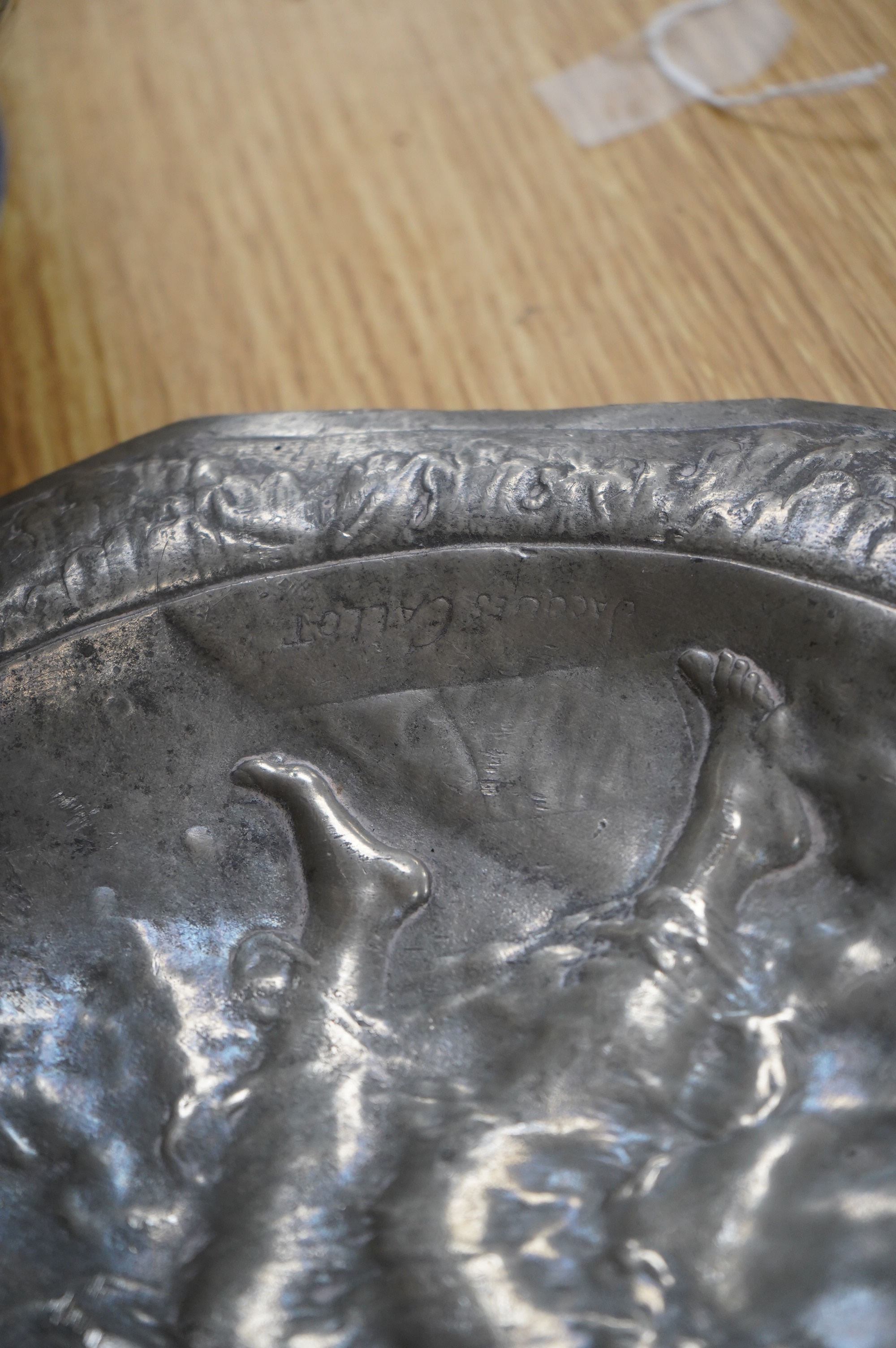 A pair of French pewter Art Nouveau plaques, signed Jacques Callot, 30cm. Condition - fair